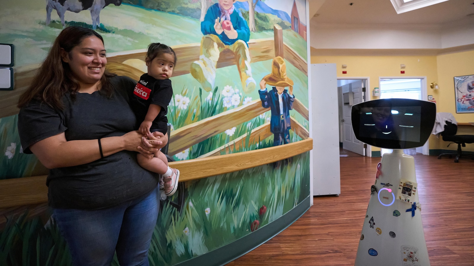 A robot programmed to act like a 7-year-old girl works to combat fear in hospitals