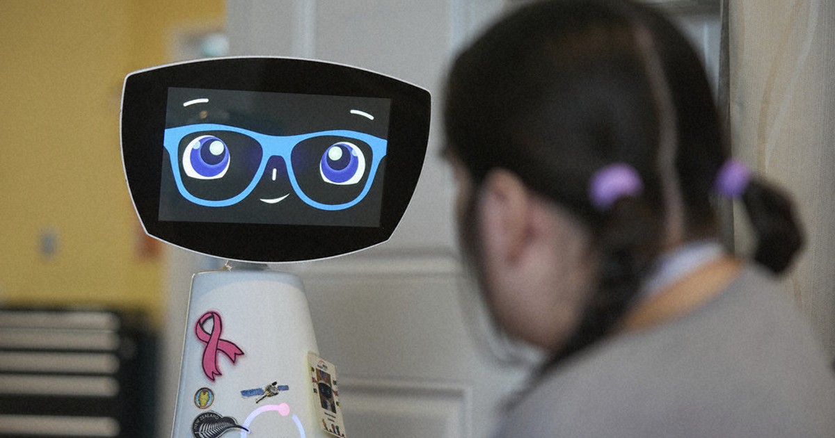 A robot programmed to act like a 7-year-old girl works to combat fear and loneliness in hospitals