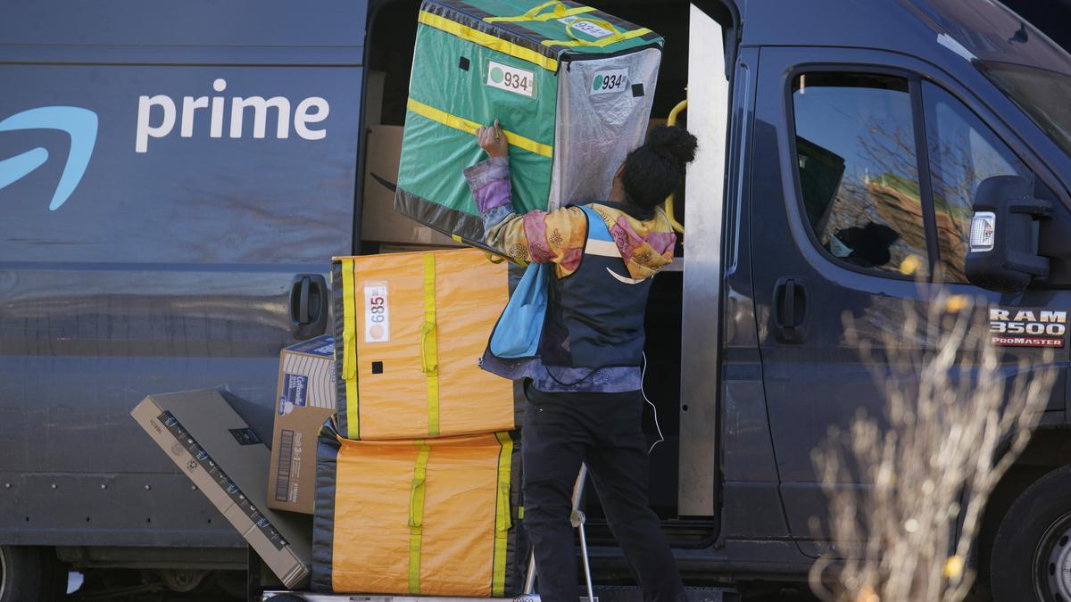 Amazon invests over $1 billion to raise employee pay, lower healthcare costs