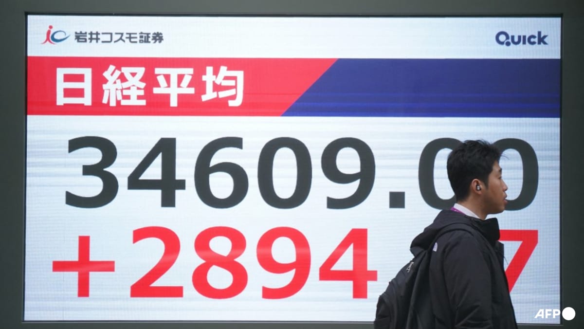 Asian markets fluctuate after Fed cuts interest rates