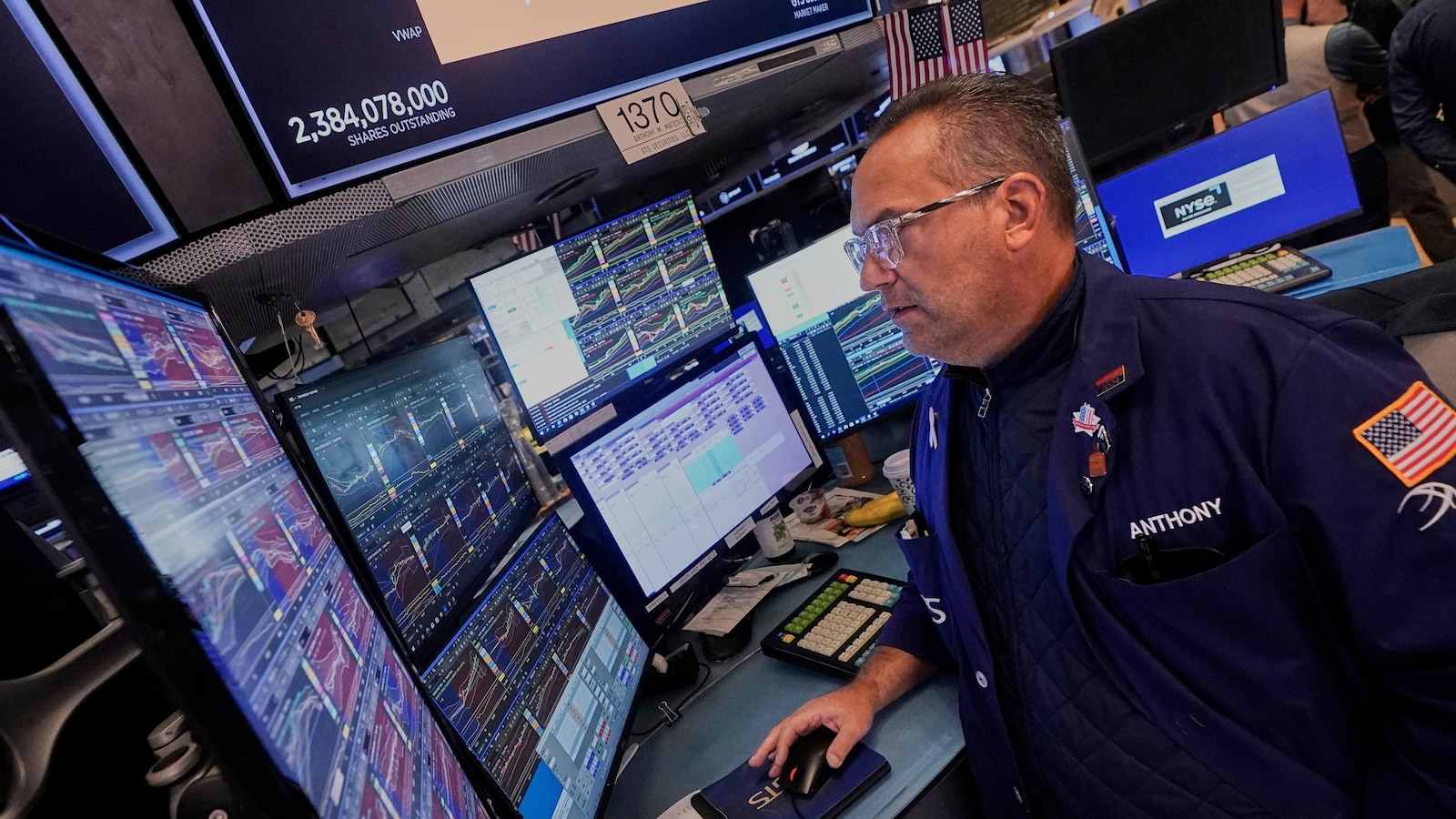 Asian shares mostly rise after Wall Street sets new records