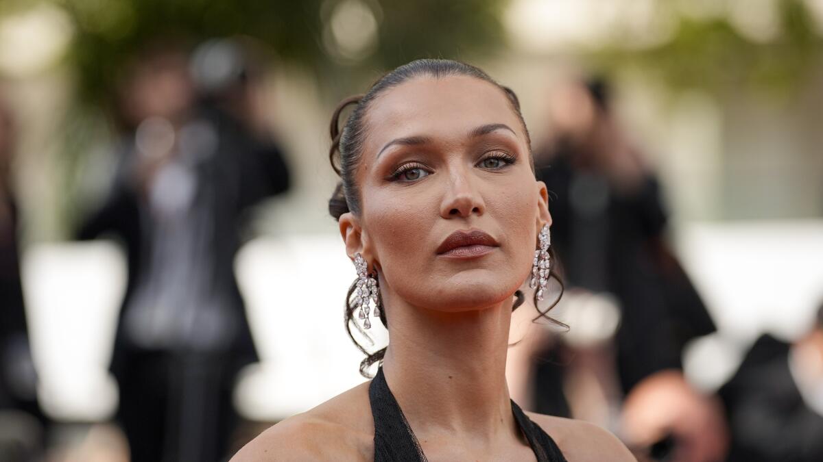 Bella Hadid is a 'Lyme warrior,' mom Yolanda says, as the model reveals a hospital stay