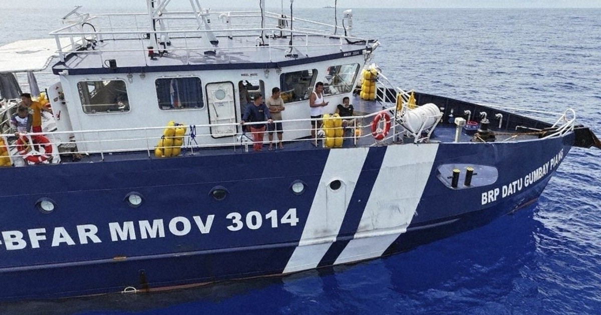 Chinese and Philippine ships collide near disputed shoal in South China Sea