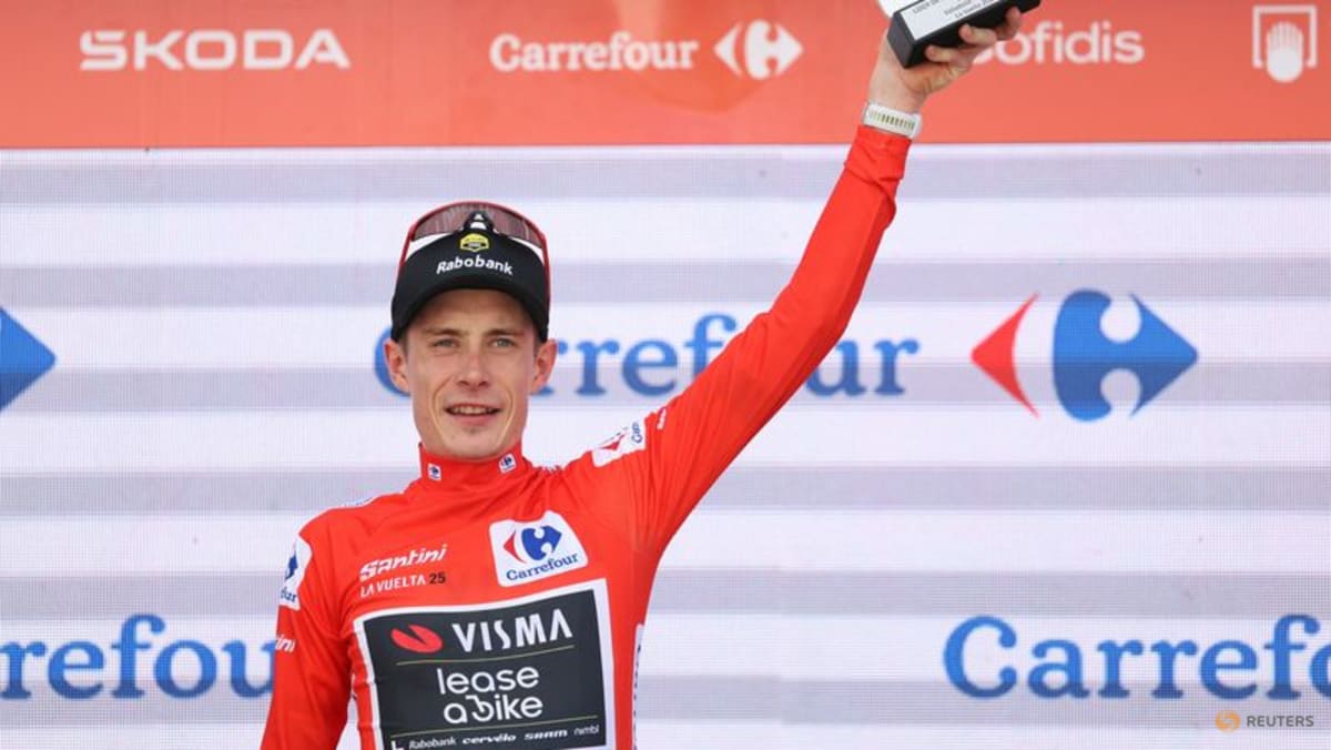 Cycing-Vingegaard celebrates Vuelta win in car park, atop drinks cooler