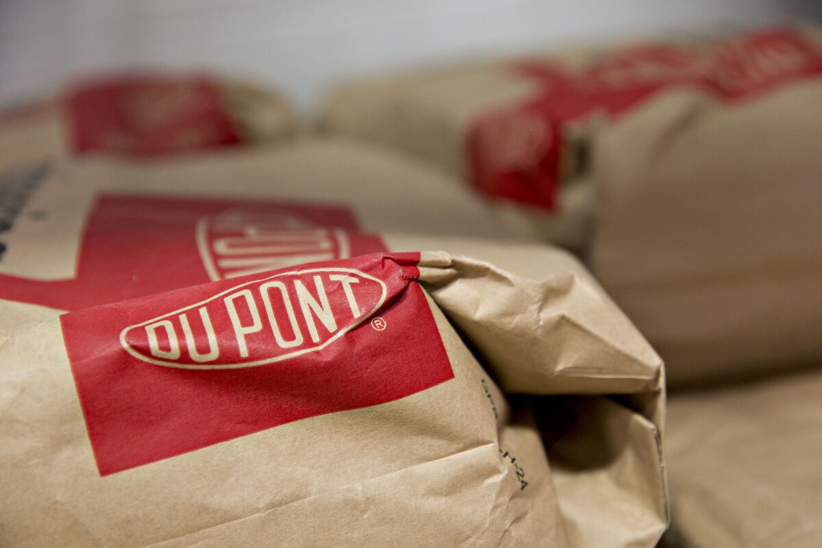 DuPont Tweaks Bond Exchange to Allow Buybacks Even With Pushback