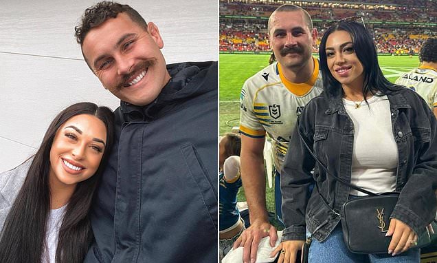 Footy star's wife dumps his possessions on the front lawn after axing