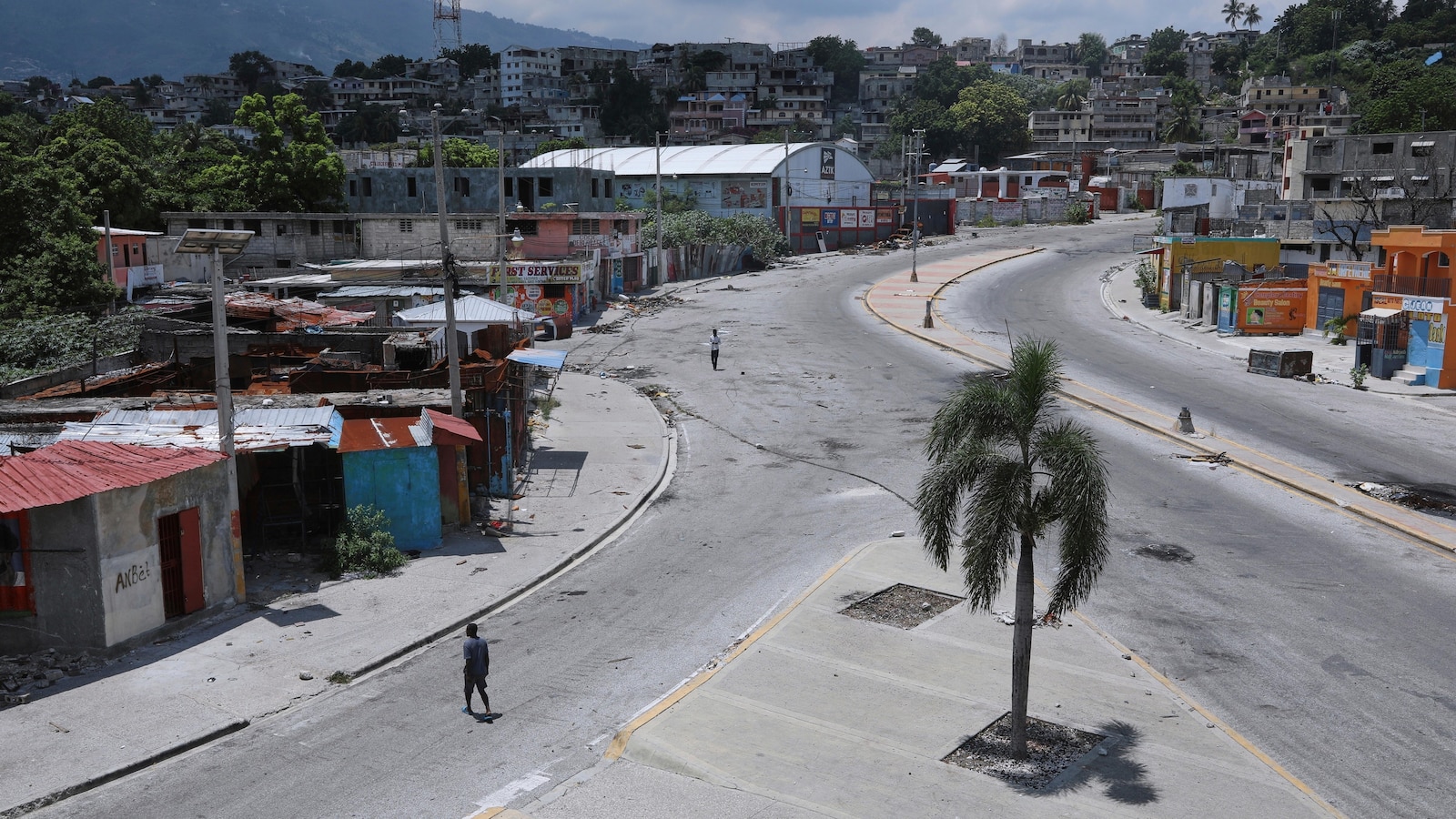 Haitians yearn for home as gangs welcome them and police warn it's too dangerous