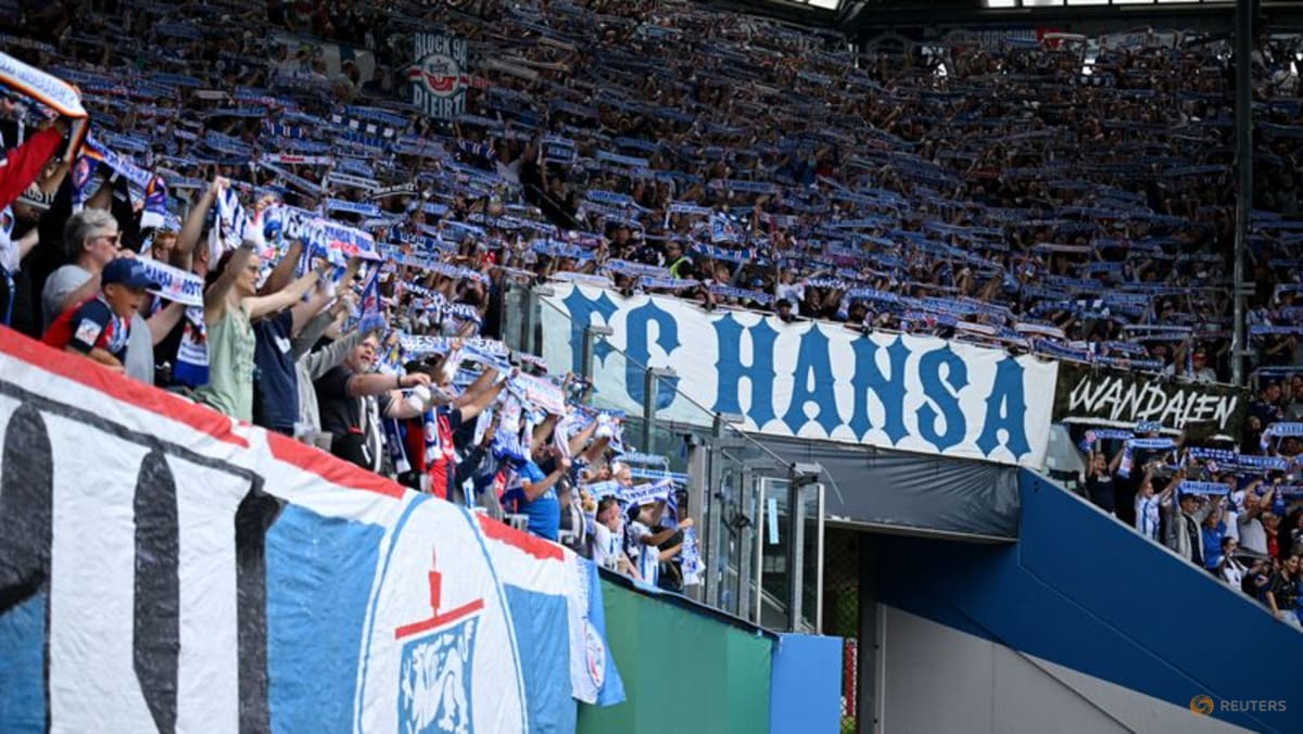 Hansa Rostock apologise after nine-year-old injured by pyrotechnics