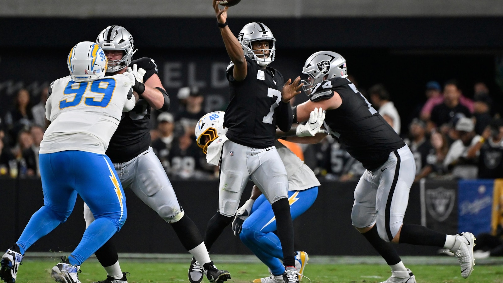 Herbert and strong defense lead Chargers to 20-9 win over Raiders