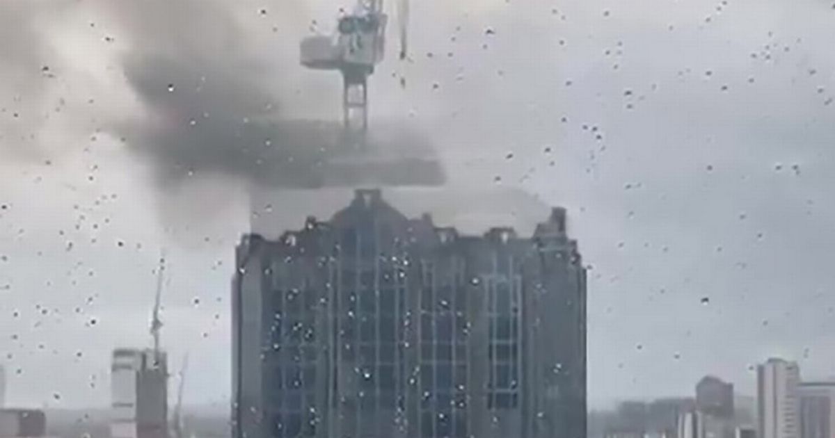 High-rise building goes up in flames in busy city centre causing travel chaos