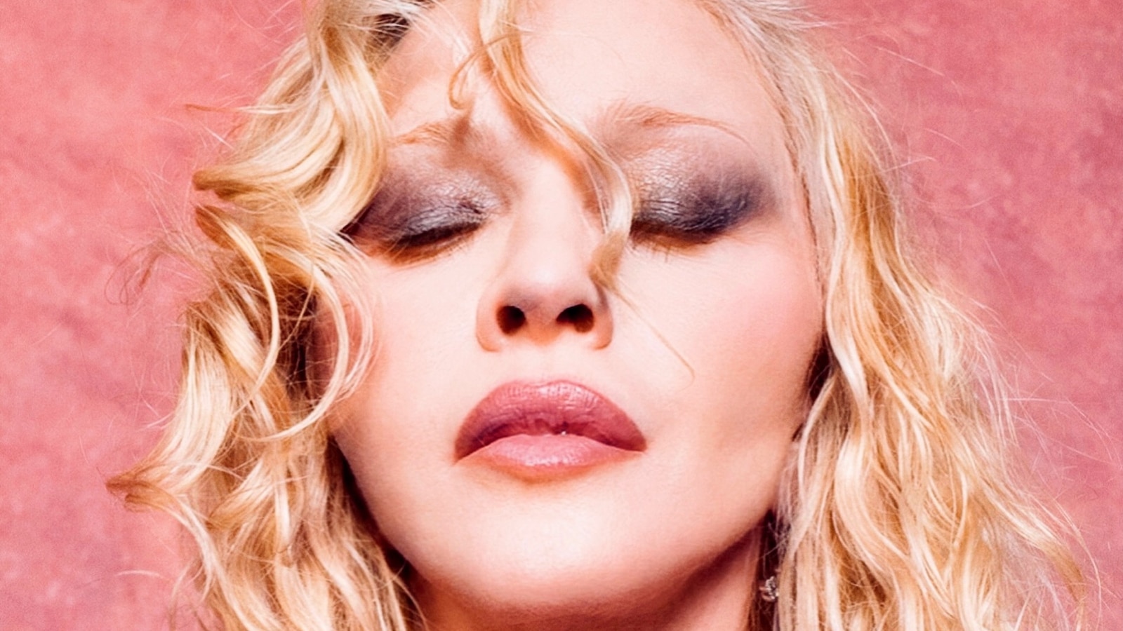 Madonna to release new dance album next year, return to Warner Records