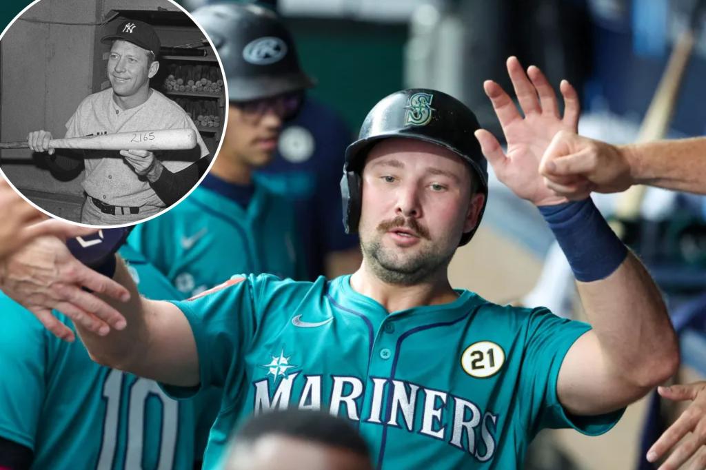 Mariners' Cal Raleigh breaks Mickey Mantle's single-season home run...