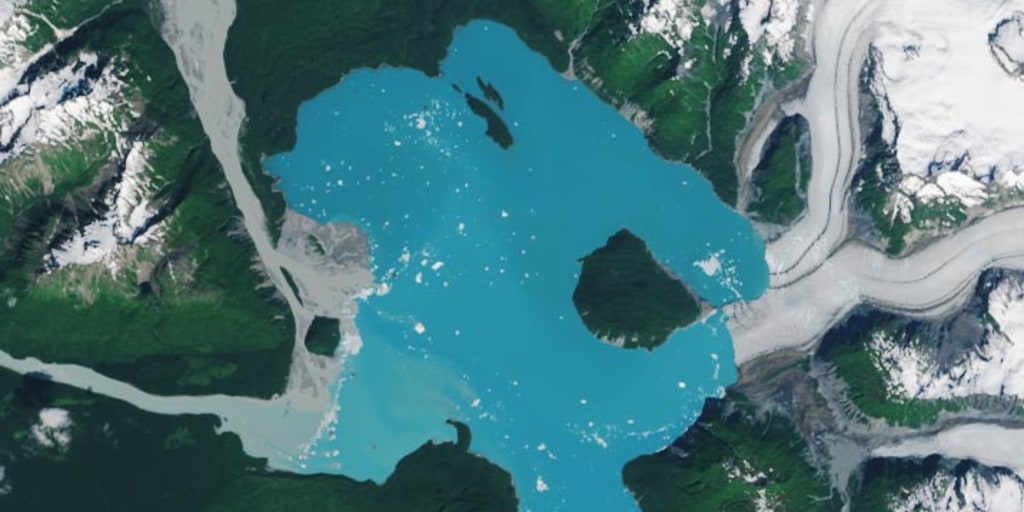 Melting glacier creates a new island in Alaska, satellite images show
