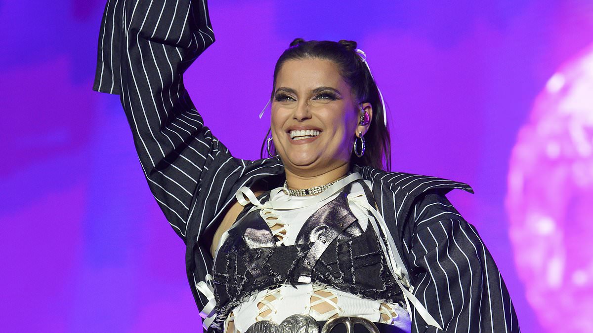 Nelly Furtado Dazzles on Stage in Bold Cut-Out Top and Mini Skirt - Internewscast Journal