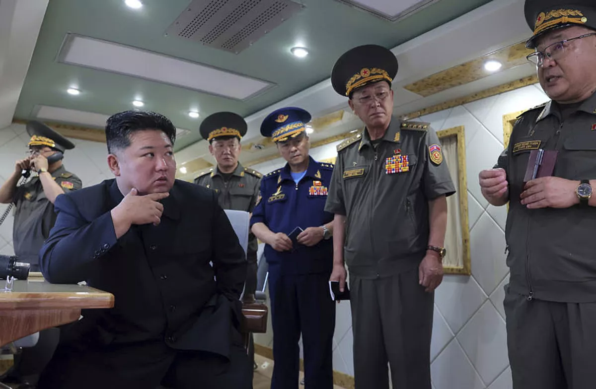North Korea's Kim Jong Un oversees new "unique and special" missile test