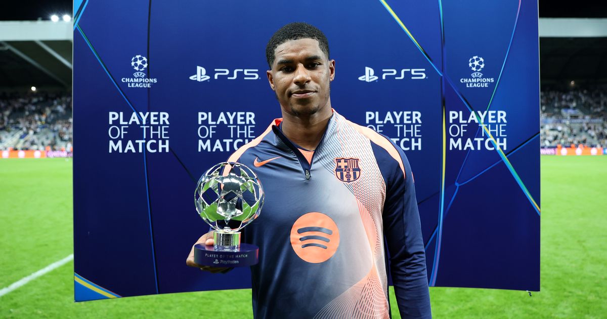 Pitch invader tackled by security as Marcus Rashford collects award after Newcastle United clash - The Mirror