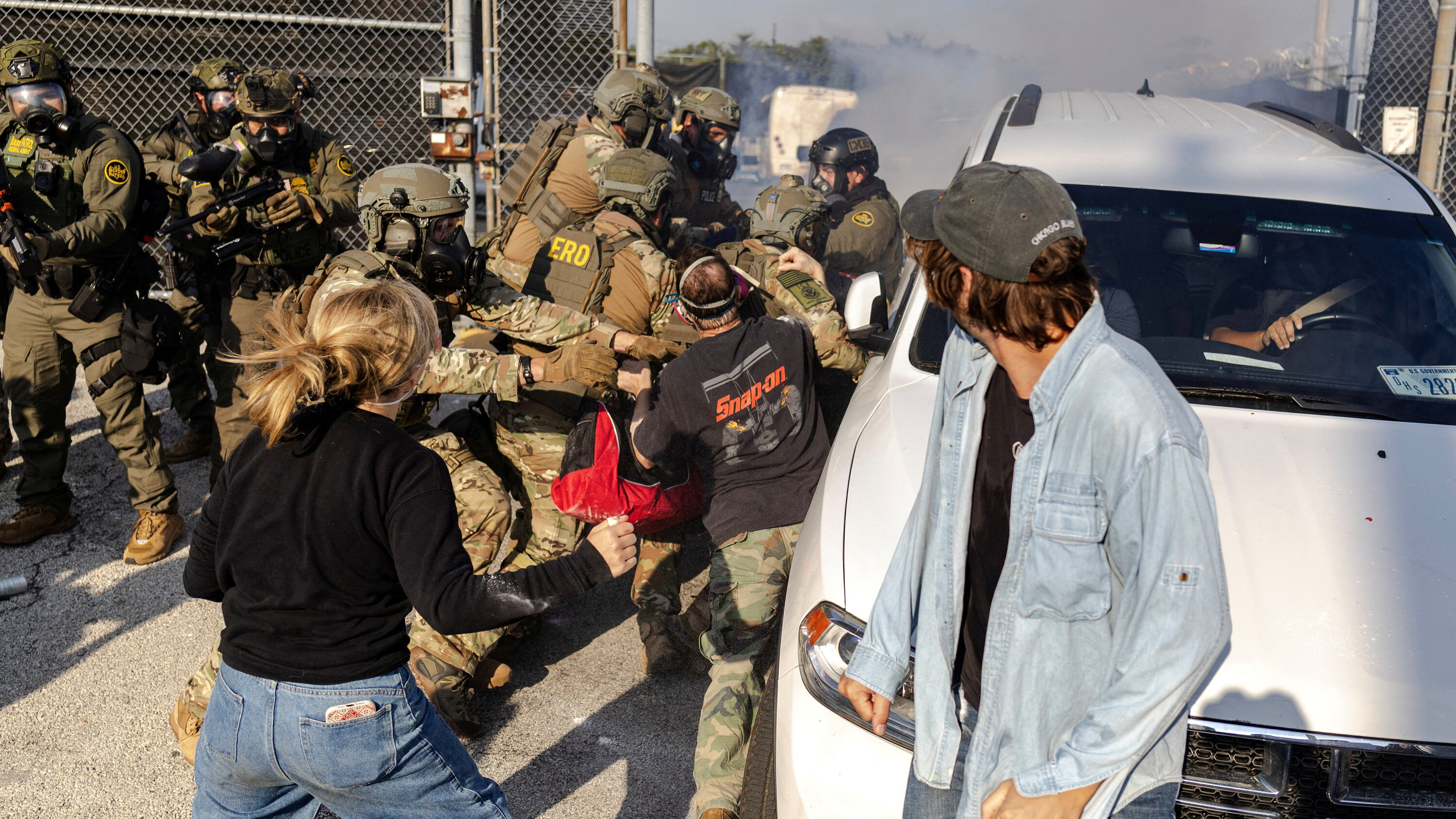 Protesters and federal agents clash outside an ICE detention facility near Chicago.