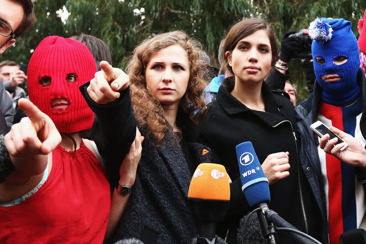 Russian court sentences Pussy Riot members in absentia to jail for anti-war messages