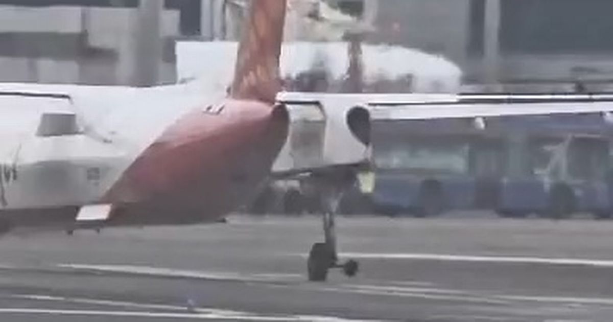 Shocking moment plane forced into emergency landing as wheel falls off - The Mirror