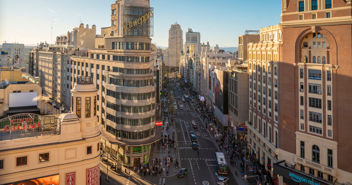 Standoff as man 'covered in blood' threatens explosion in major city centre
