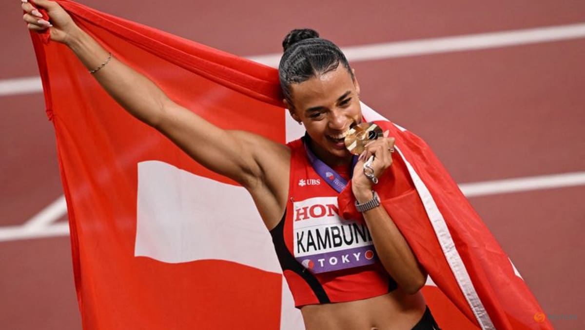 Swiss Kambundji takes shock world 100m hurdles crown