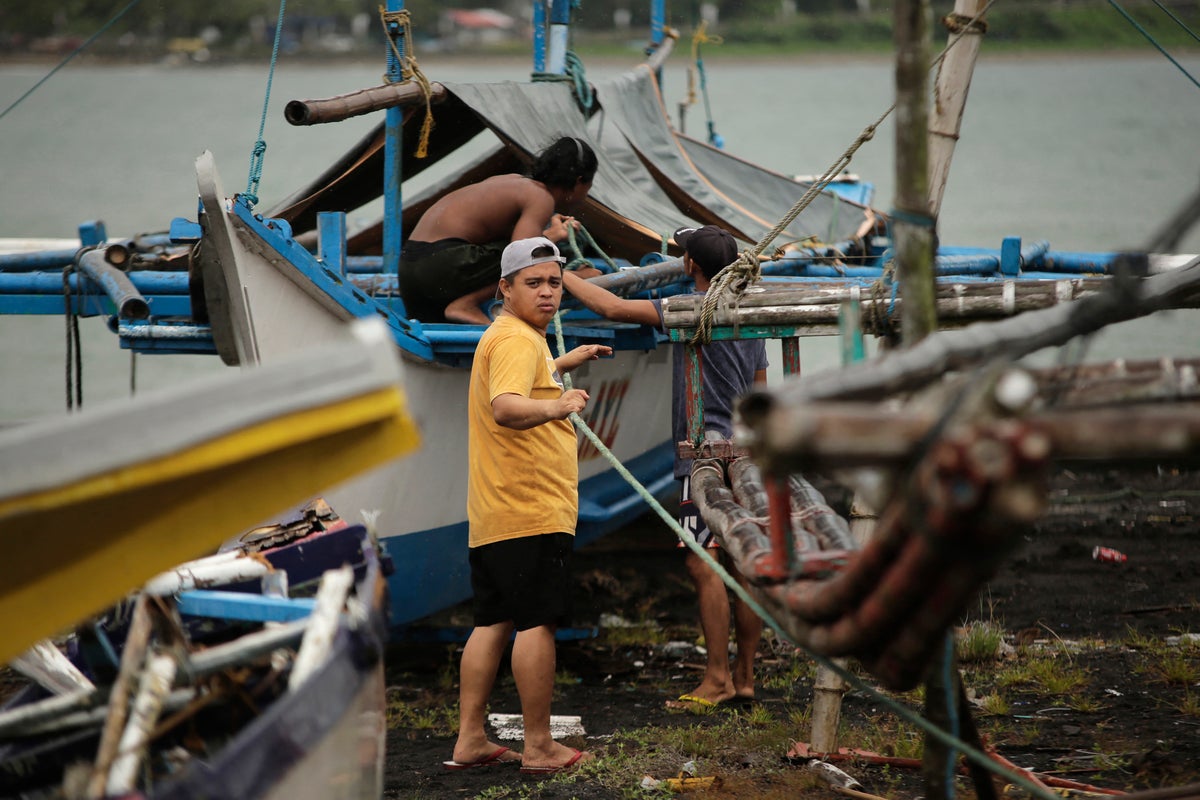 Typhoon Bualoi batters Vietnam after killing 20 in Philippines