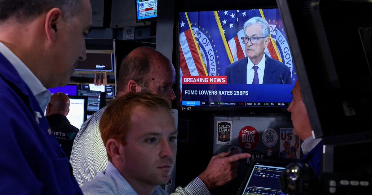 U.S. stocks surge to record highs on Fed, U.S.-China optimism