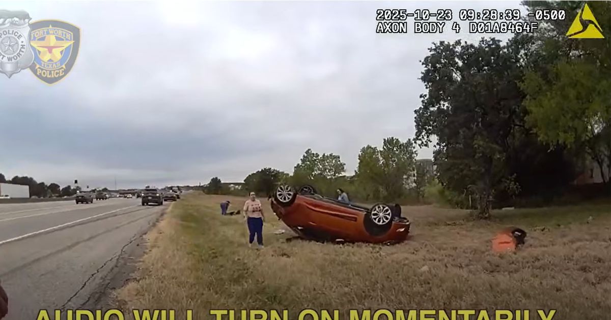 Baby trapped under overturned car after crash as video shows heart-wrenching rescue - The Mirror