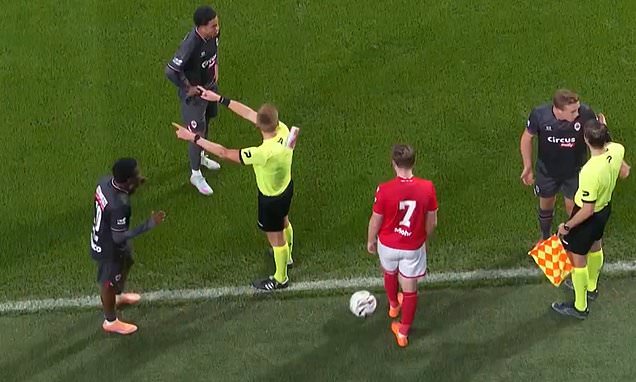 Belgian top-flight match abandoned after fan throws cup at referee