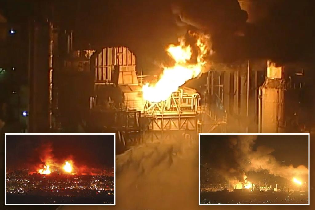 California oil refinery fire rocks LA area, lights up night sky