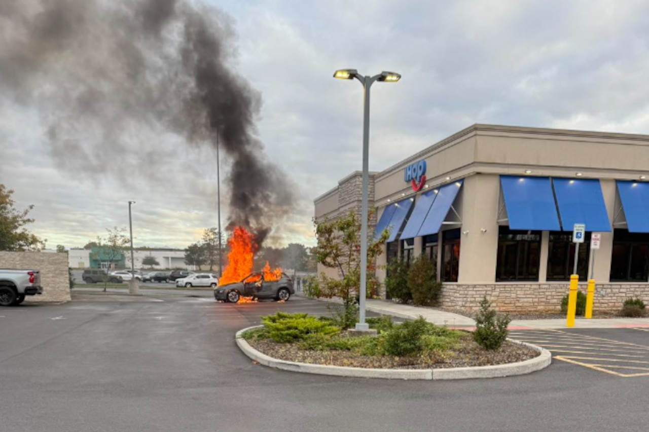 Electric car destroyed by fire outside Clay restaurant