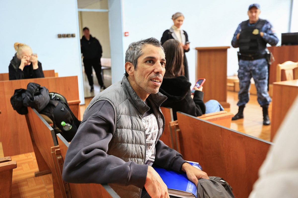 Cyclist says he will continue record-breaking attempts despite Russian prison spell