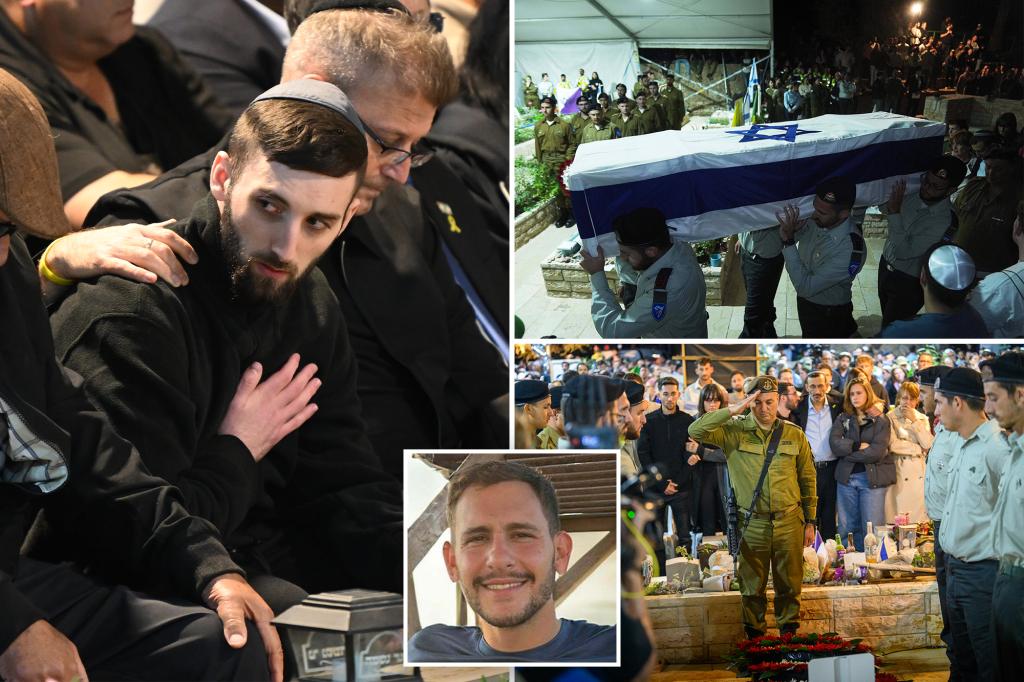Just-released hostage attends funeral of fellow soldier, whose body...