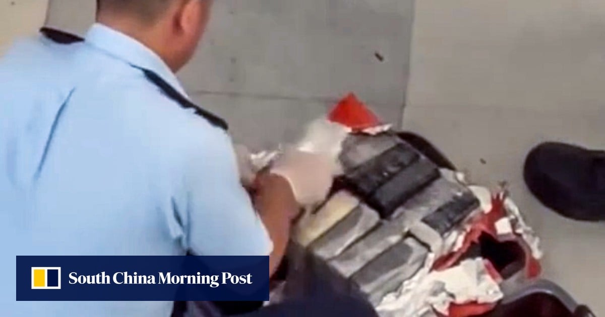 Man arrested at Hong Kong station after 13kg of cocaine found in suitcase