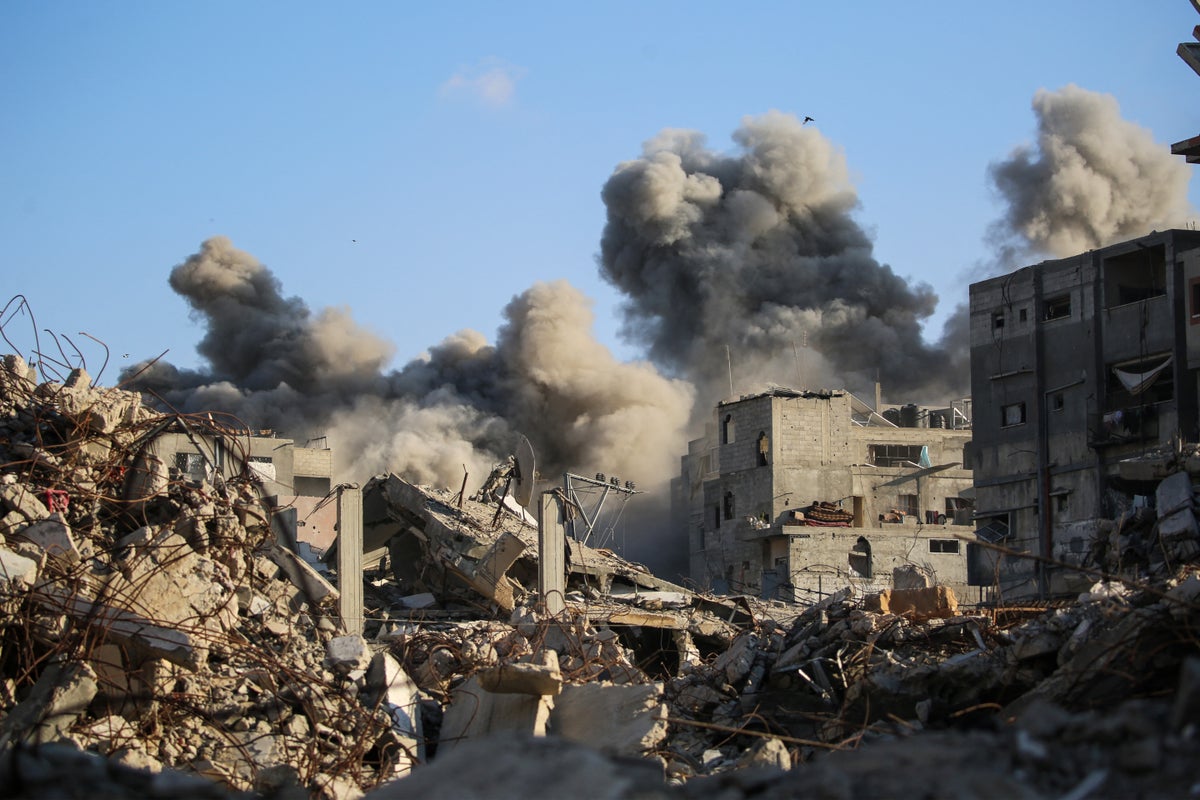 Latest: Israel carries out fresh strikes and suspends aid into Gaza