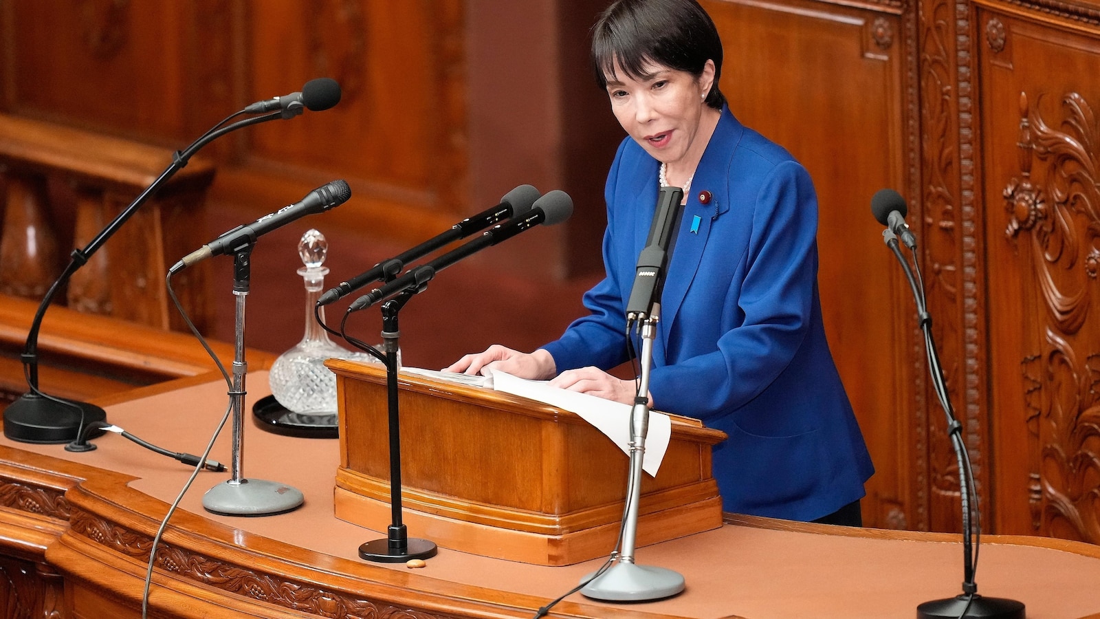 Japan's new leader vows to further bolster defense buildup and spending as regional tensions rise