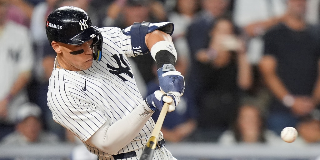 Judge rallies Yankees past Blue Jays 9-6 to save season, avert ALDS sweep