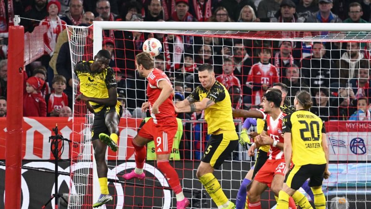 Kane is scorer and provider as Bayern snap Dortmund's unbeaten run with 2-1 win