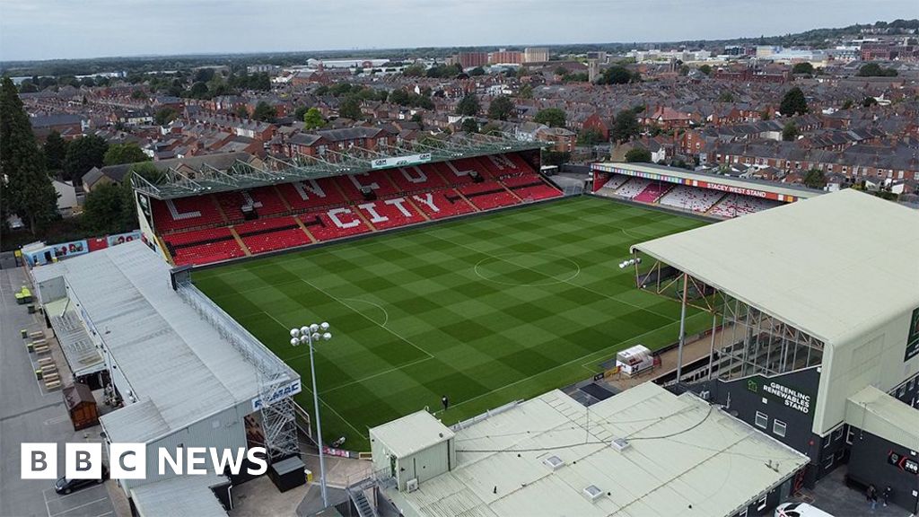 Lincoln City fined over fans abuse of Wrexham's James McClean