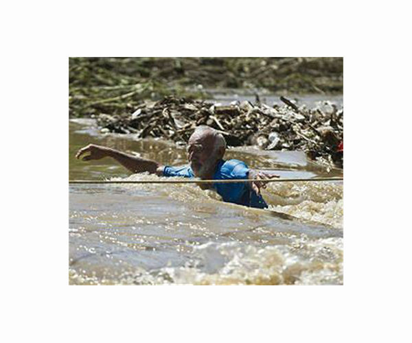 At least 64 dead, 65 missing in Mexico floods; Spain's Valencia region on red alert for torrential rain