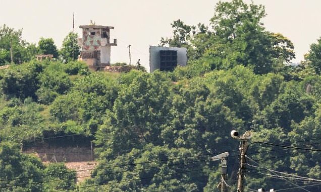 North Korean soldier held by Seoul after crossing land border