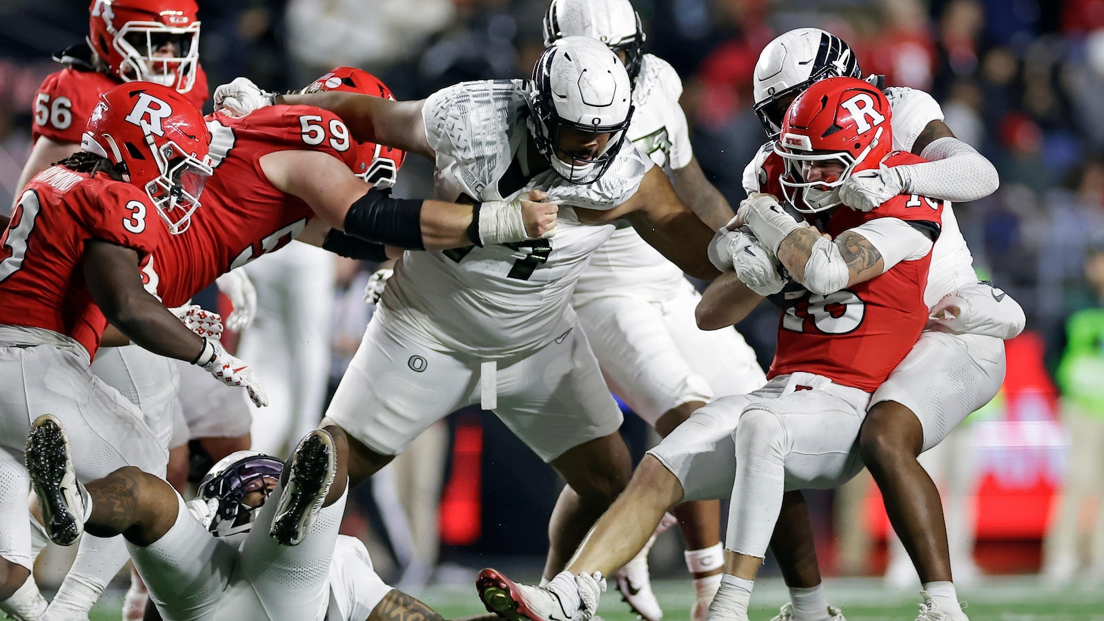 No. 8 Oregon follows first loss with 56-10 romp over Rutgers