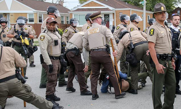 Protesters clash with police outside ICE facility in Chicago
