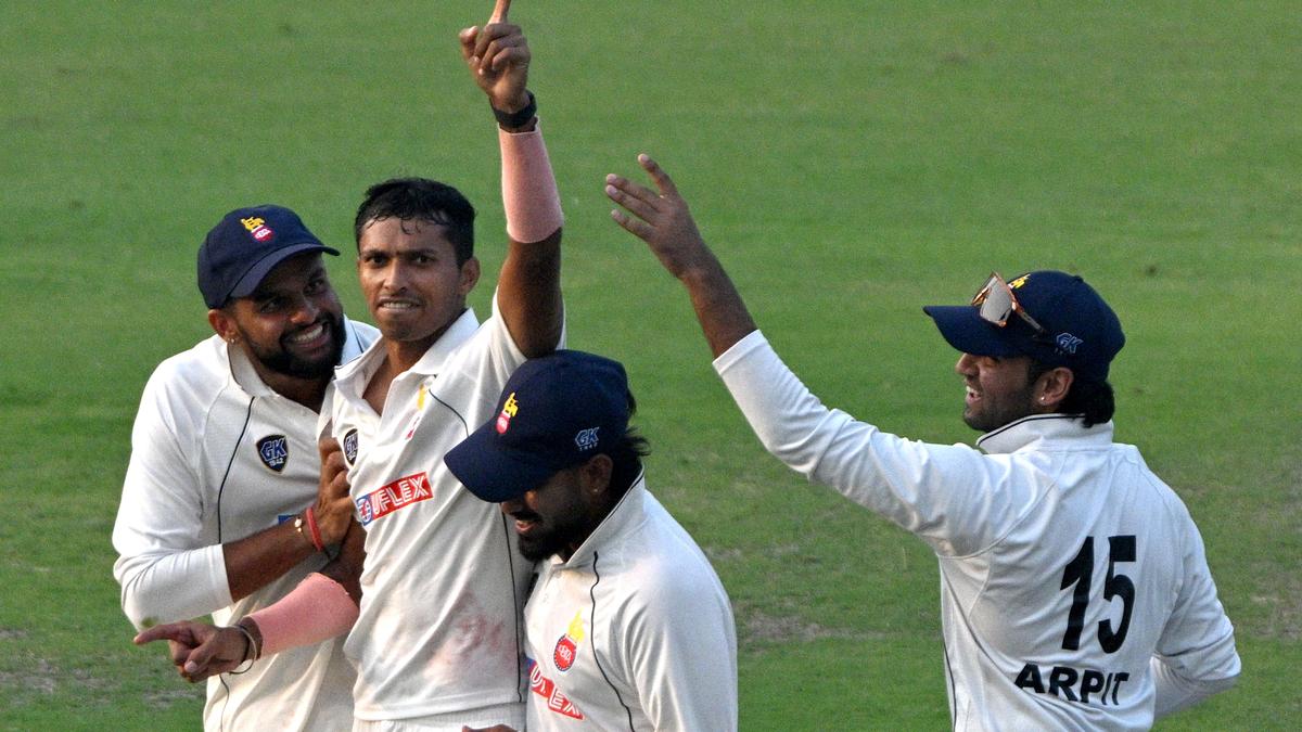 Saini strikes after Purohit's half-century