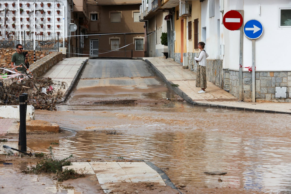 Spain floods trap people in cars as Storm Alice sparks travel chaos