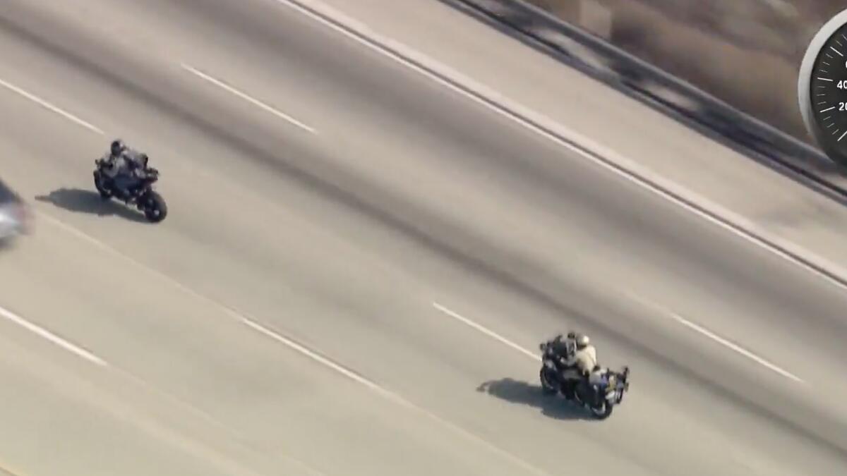 Suspect in shooting of sheriff's deputy crashes motorcycle, is airlifted from 210 Freeway