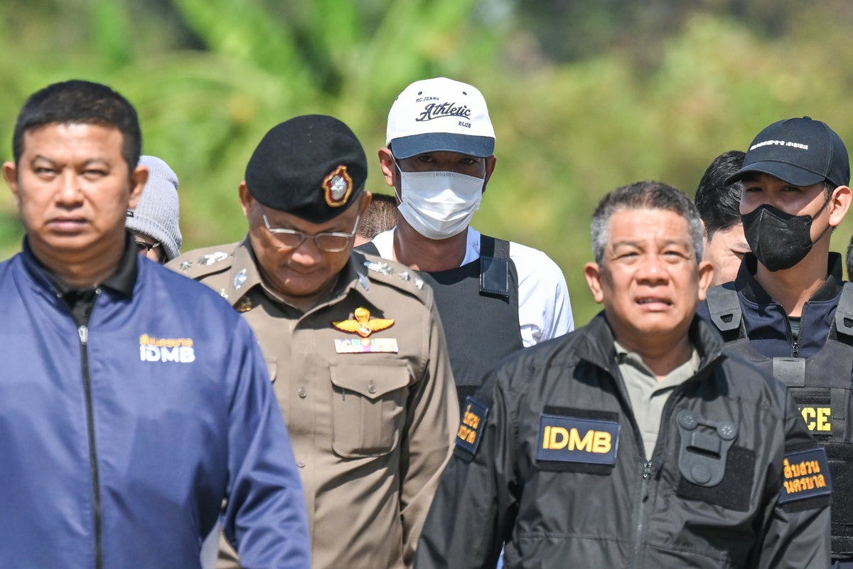 A Thai court sentences gunman who killed a Cambodian politician to life in prison