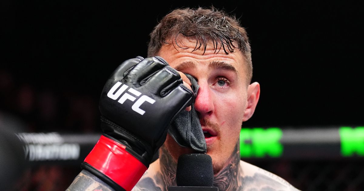 Tom Aspinall responds to boos with X-rated outburst after eye poke - The Mirror