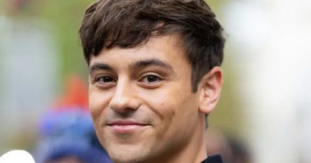 Tom Daley rivals Claudia with 'iconic' exit outfit complete with most-wanted suitcase - The Mirror