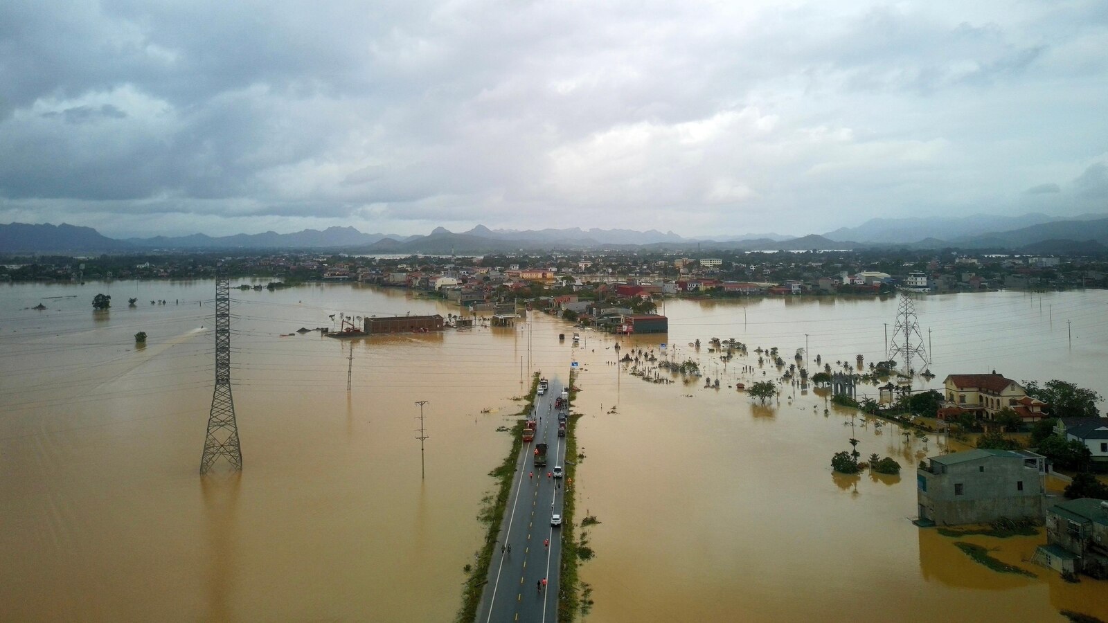 Tropical storm edges toward the Philippines and may grow to a typhoon on path toward China